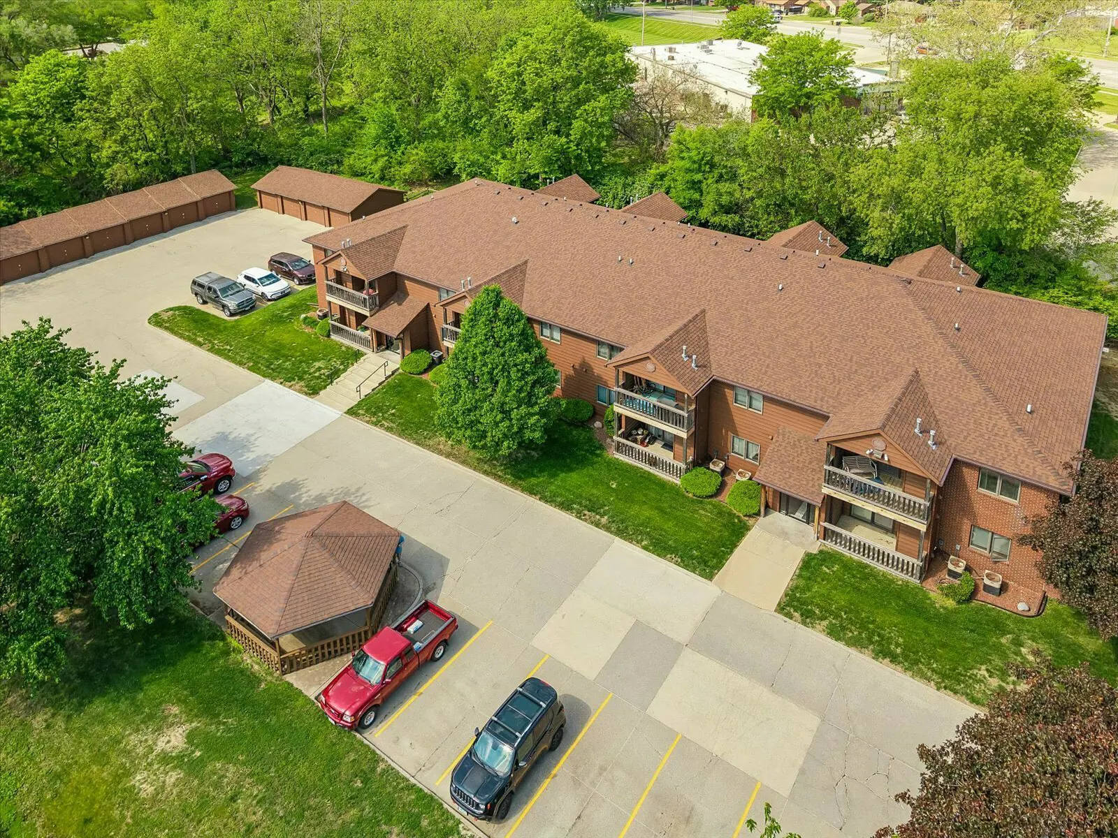 Grand and Vine Apartments from above, showing the garages and parking behind the building